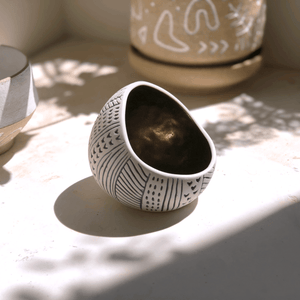 Etchform porcelain vessel in sunlight