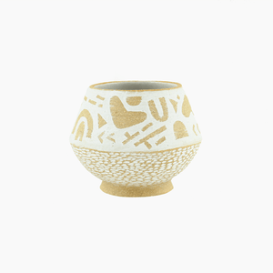 Stoneware shapes vase on plain background