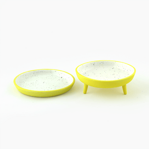 yellow speckled legged and non-legged porcelain catchalls image